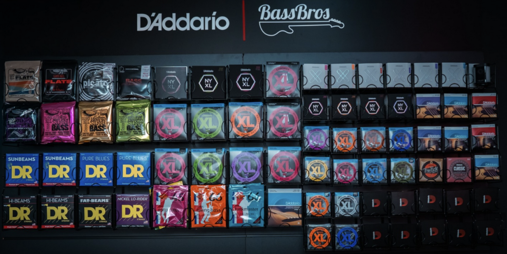 wall of bass guitar strings